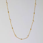 Ocean Whispers Freshwater Pearl Necklace featuring a stunning 18K gold-plated chain and natural freshwater pearls. Available in 40cm+5cm and 60cm+5cm lengths, waterproof, hypoallergenic, and tarnish-resistant.